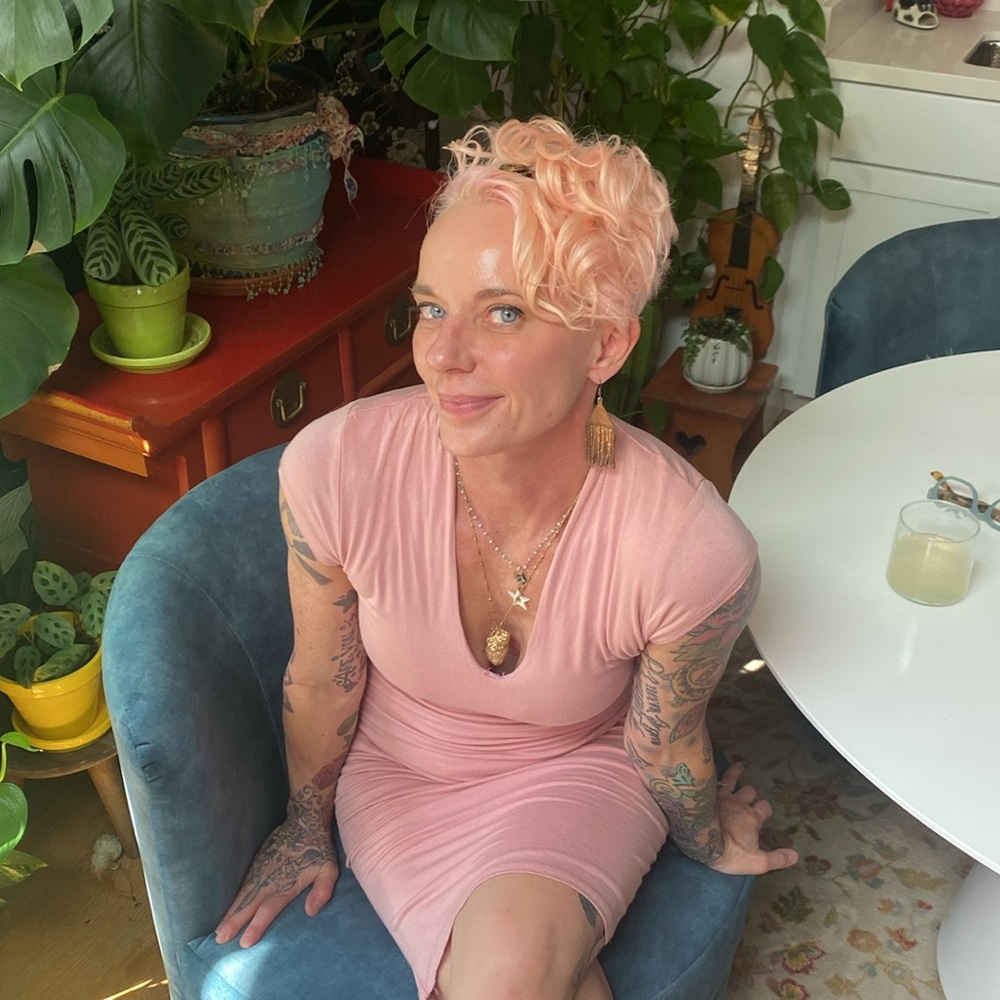 Pink long v neck dress.